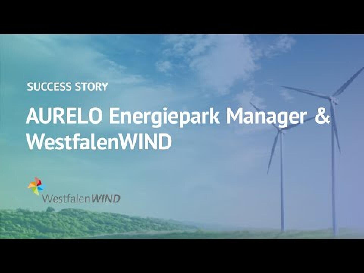 Eine Präsentationsfolie mit dem Titel ERFOLGSGESCHICHTE: AURELO Energiepark Manager & WestfalenWIND vor blauem Himmel, zwei Windrädern und dem WestfalenWIND-Logo in der unteren linken Ecke.