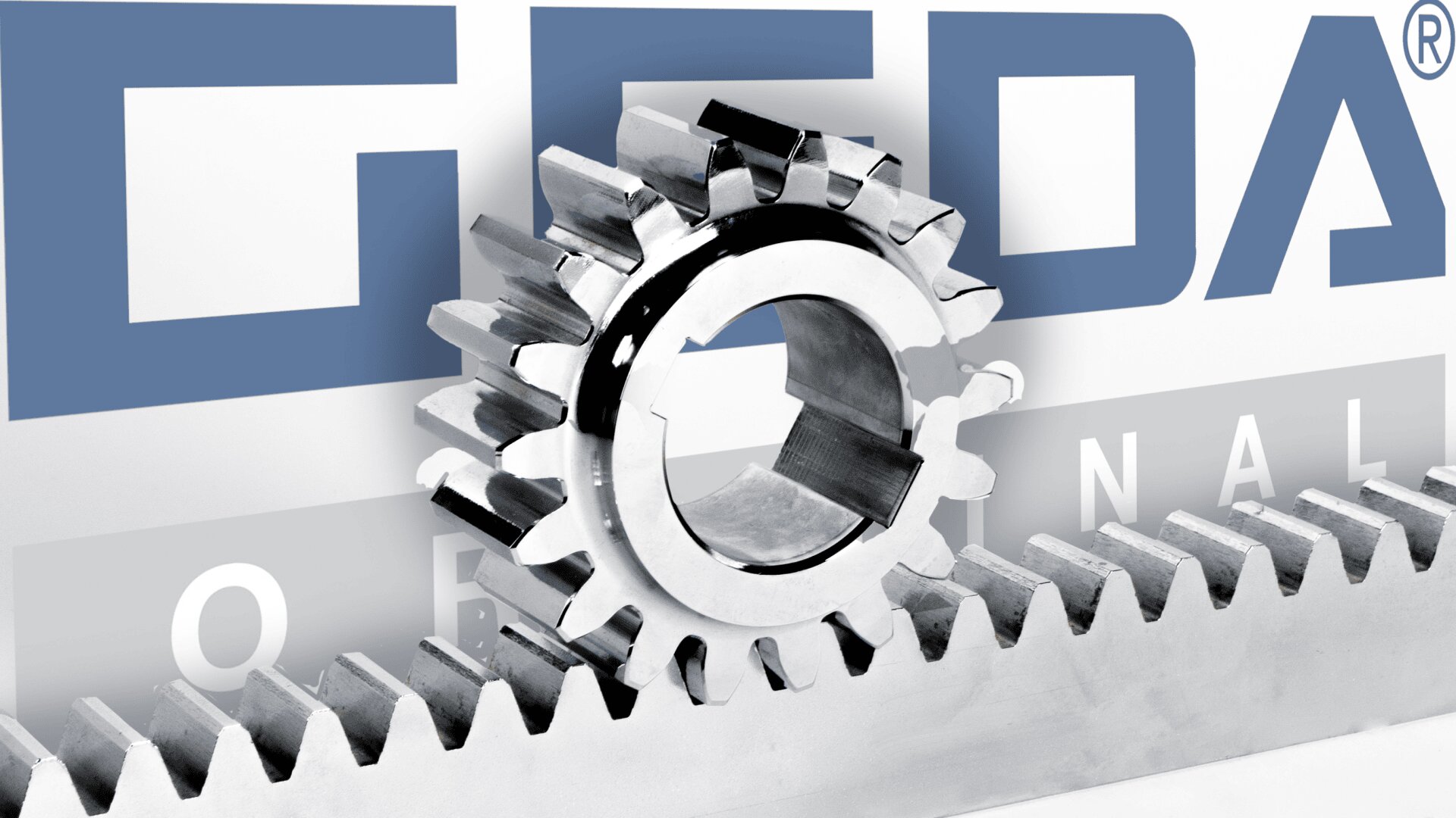A shiny metal gear sits upright on a metal rack in front of a wall with the large blue letters GEDA and the word ORIGINAL partially visible in the background.